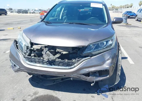 2015 Honda Cr-V Touring z USA, uszkodzony, nr VIN 5J6RM4H96FL133000